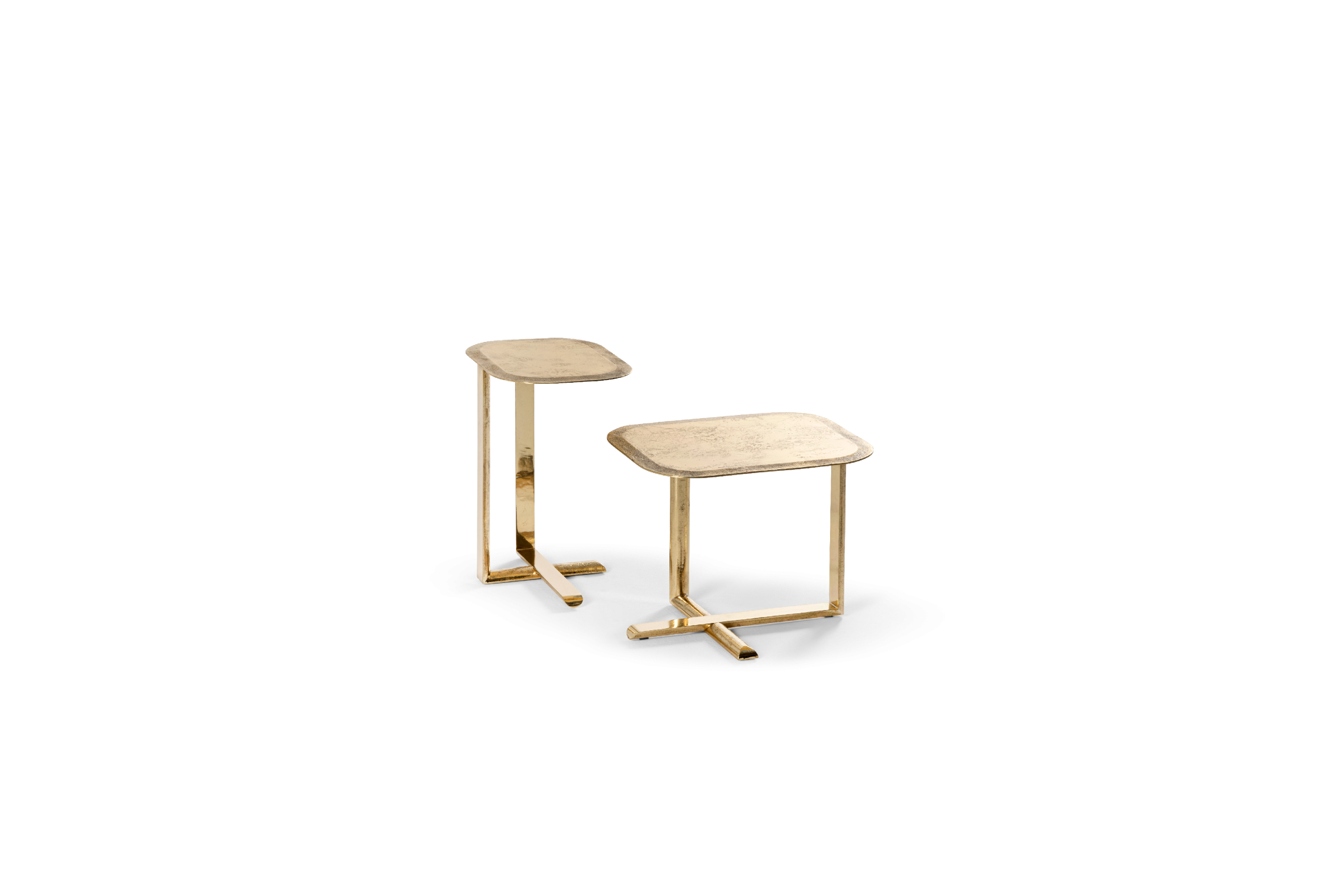 Two small side tables with gold frames on a white background