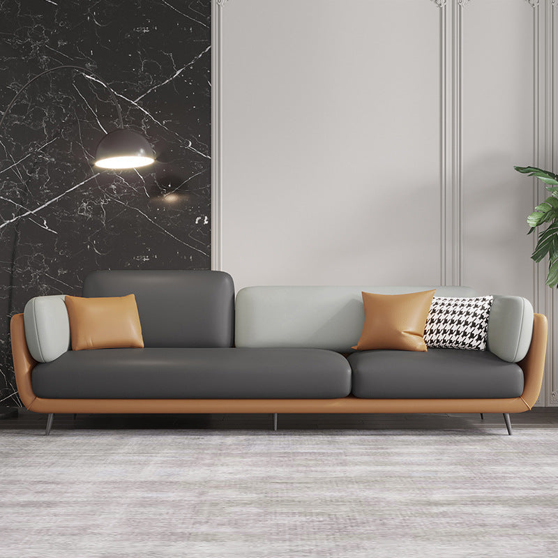 Three-seater leather sofa with metal legs