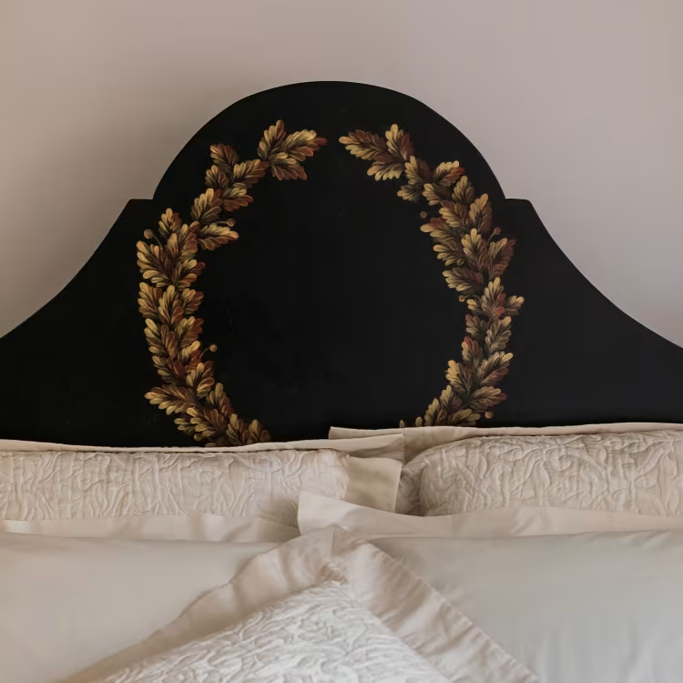 Black roma queen size bed with laurel crown