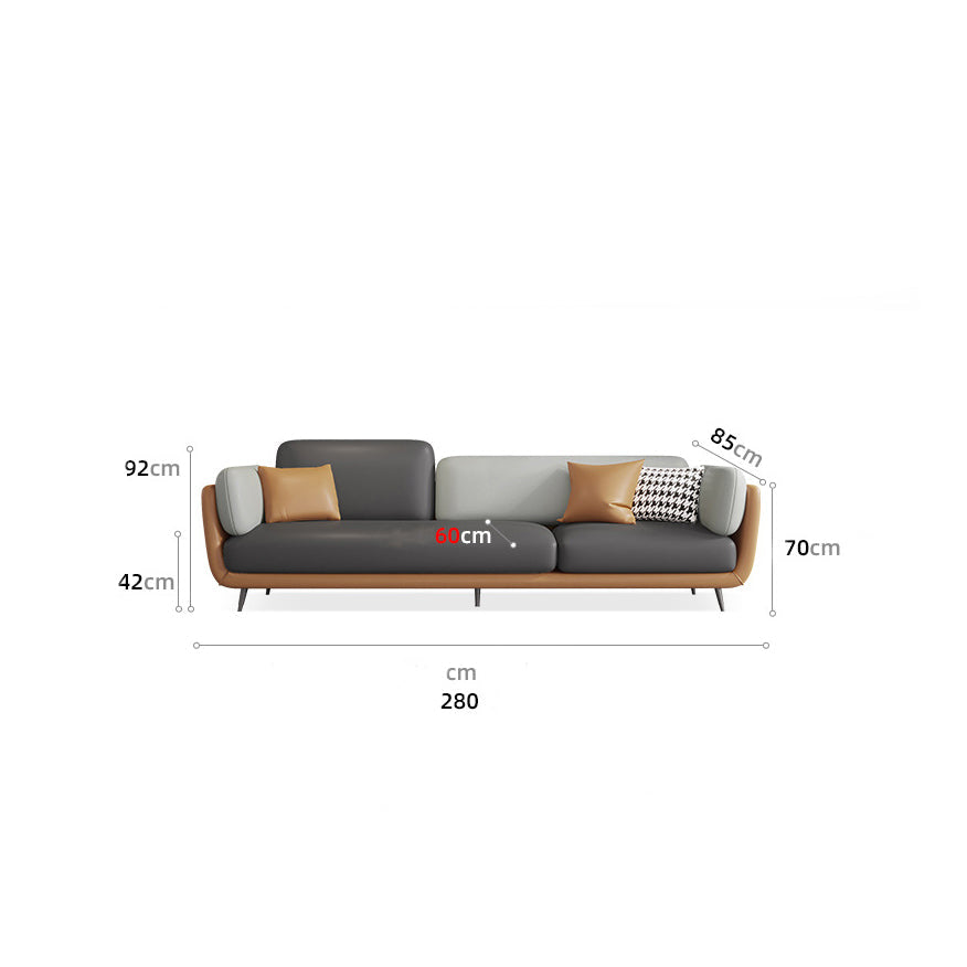 Three-seater leather sofa with metal legs