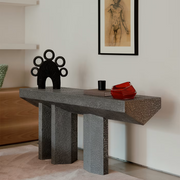 Imperfetto asymmetrical three-legged liquid metal tin console