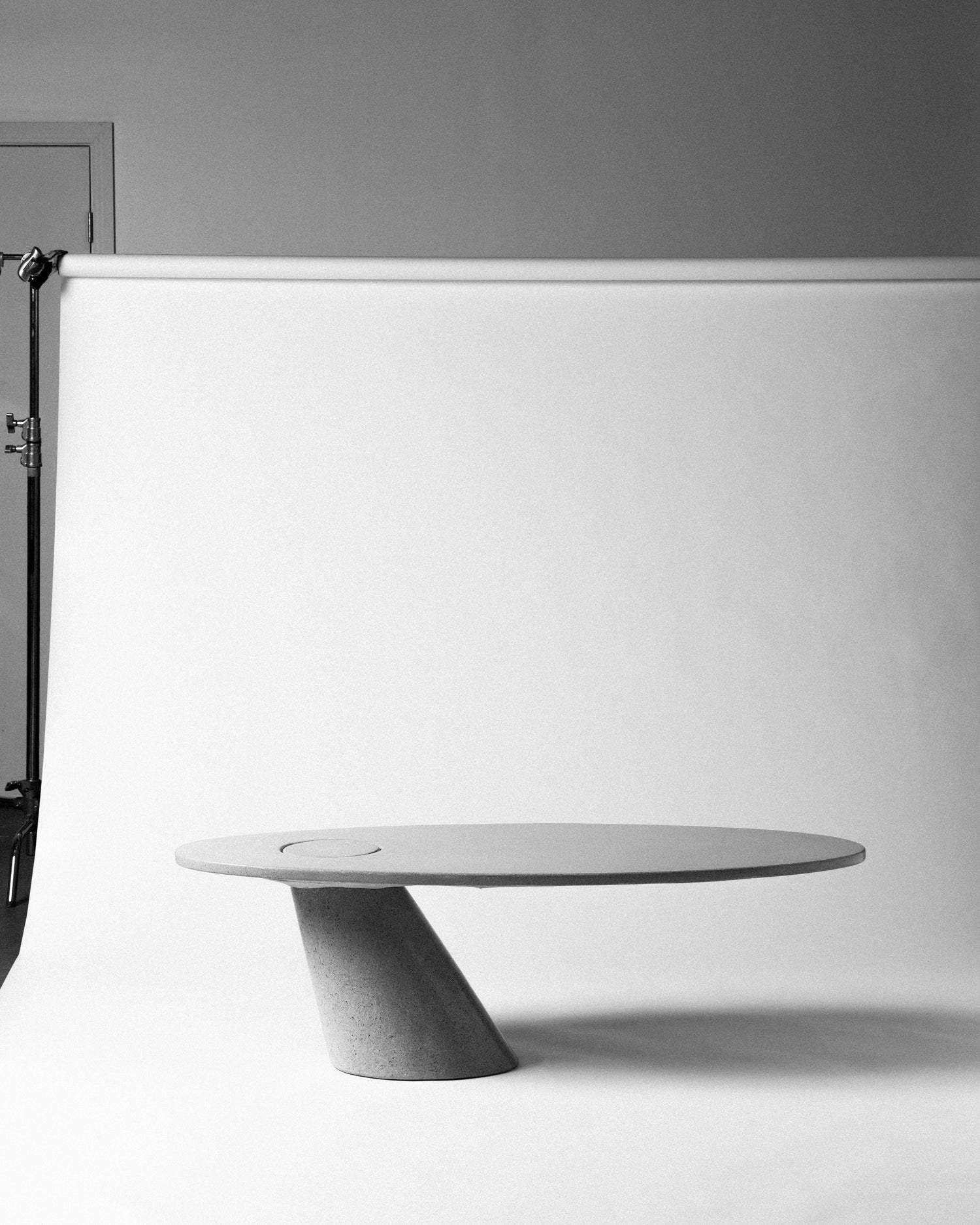 Sloping concrete coffee table