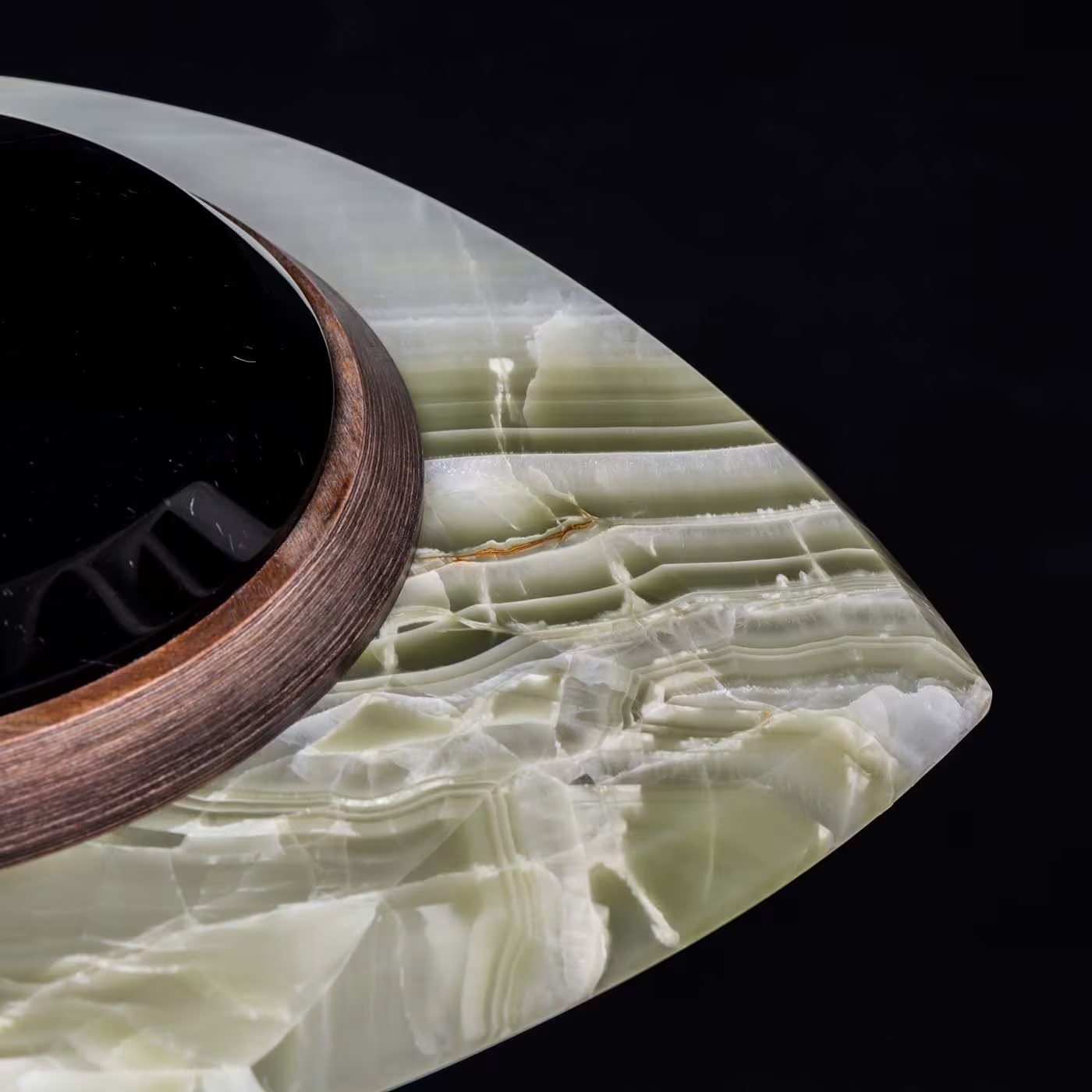 The eye side table in green and black