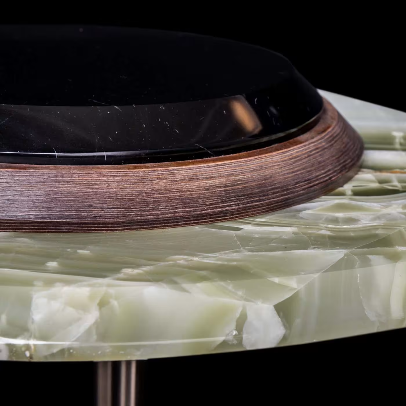 The eye side table in green and black
