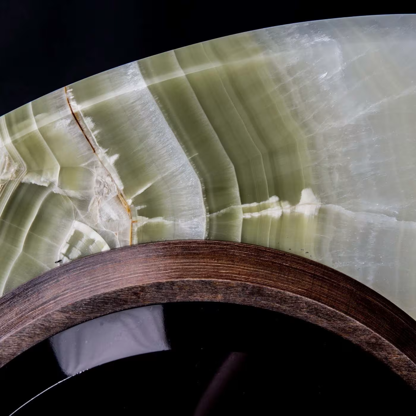The eye side table in green and black