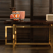 Charlotte console with brass-plated metal base