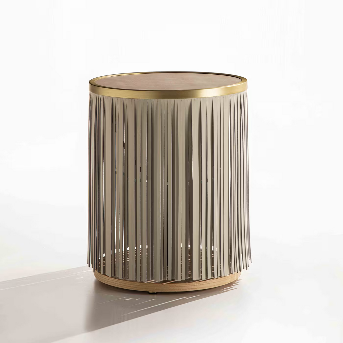 Indian ash side table with gray leather fringe