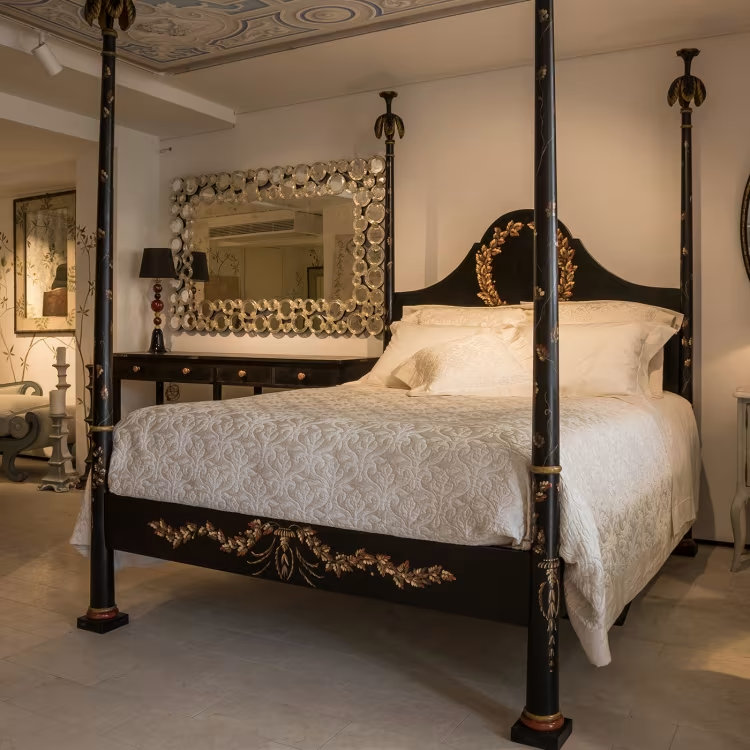 Black roma queen size bed with laurel crown