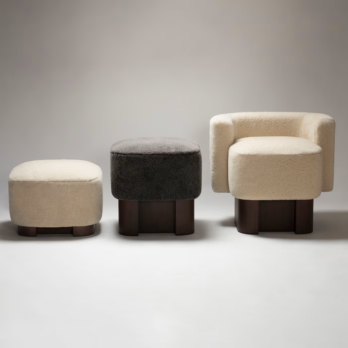 Lloyd black wood high pouf